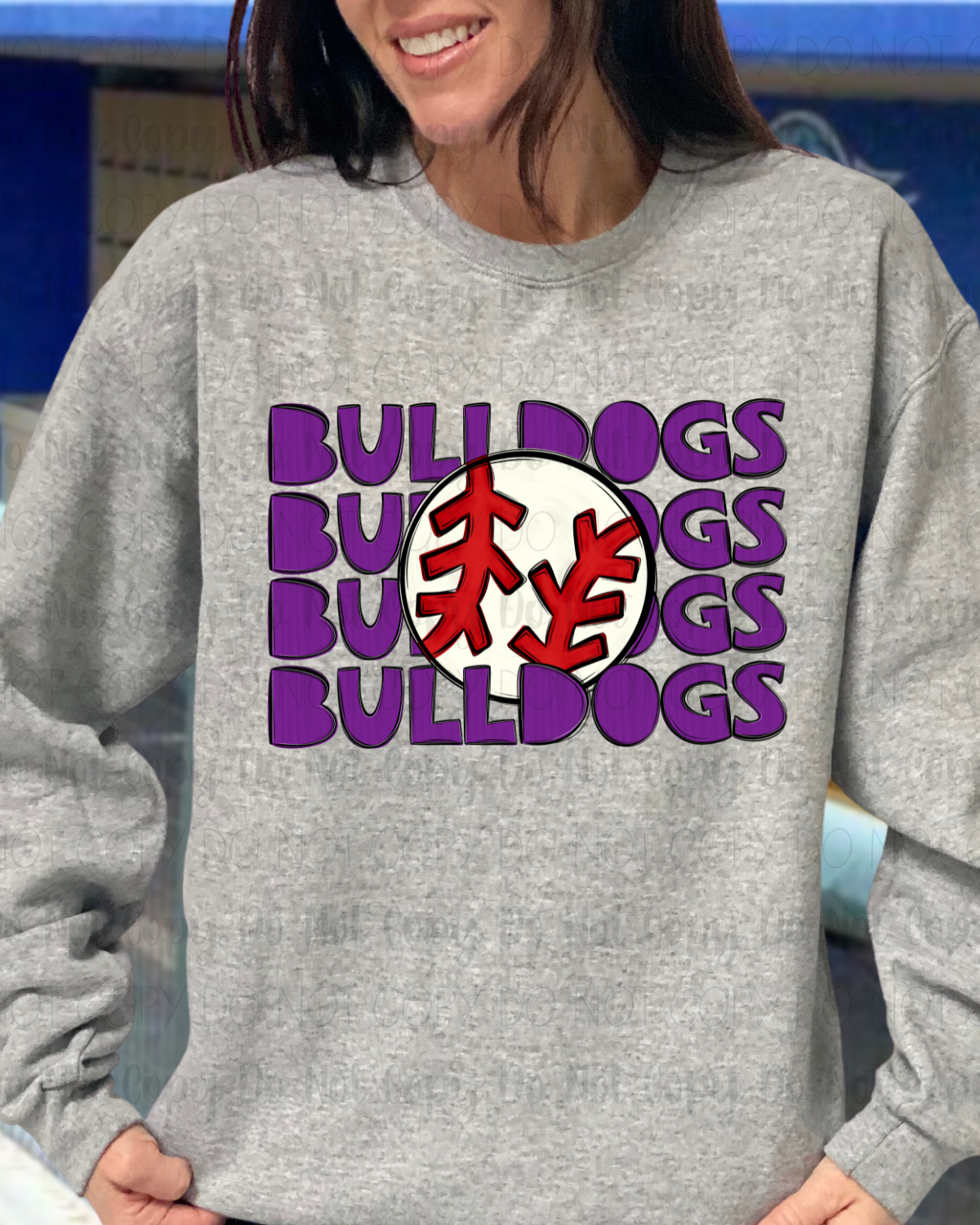 Person wearing a gray sweatshirt with 'Bulldogs' text and logo.