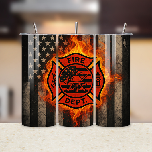 Tumbler with fire department design featuring flames and American flag on a blurred background