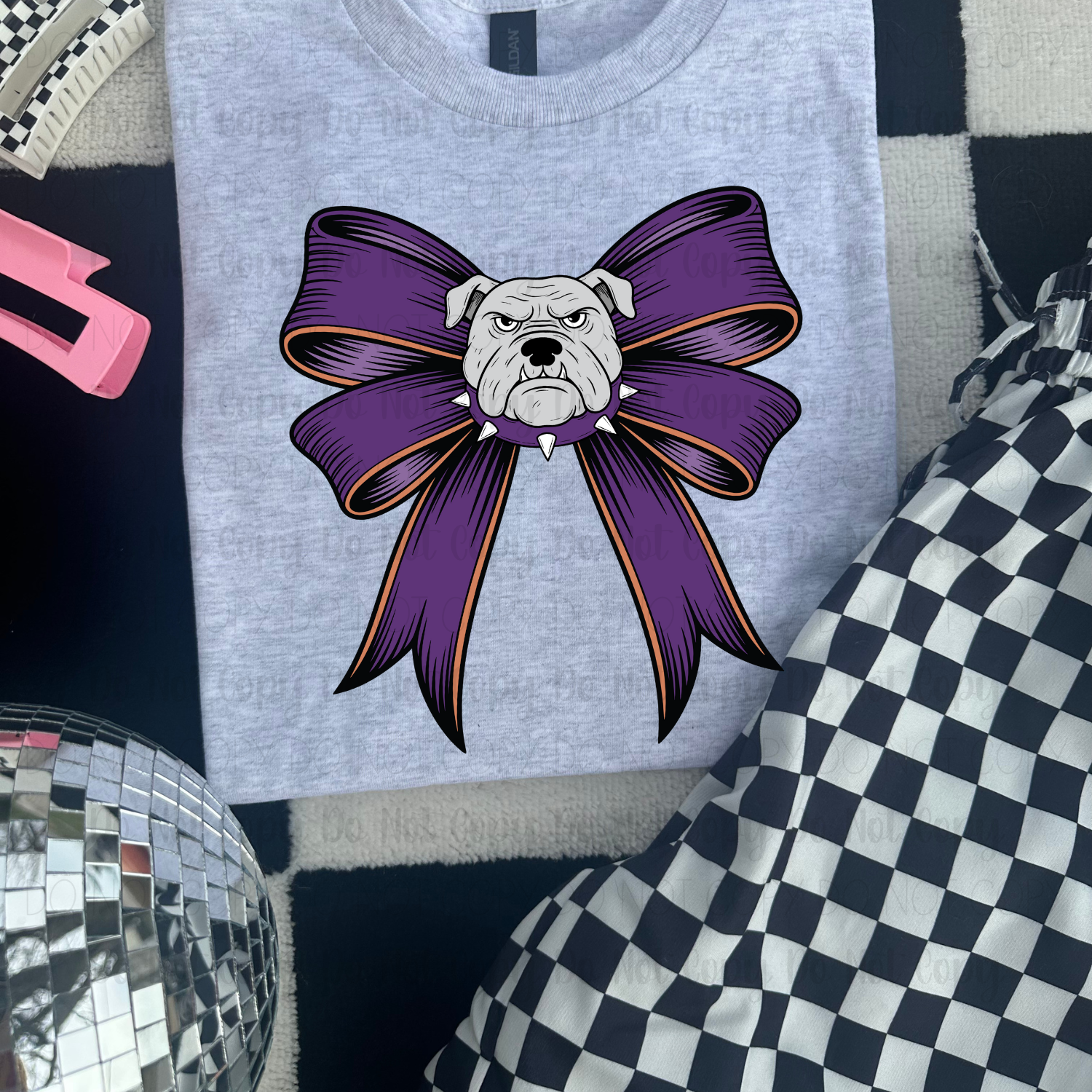 Gray t-shirt with a bulldog wearing a purple bow 