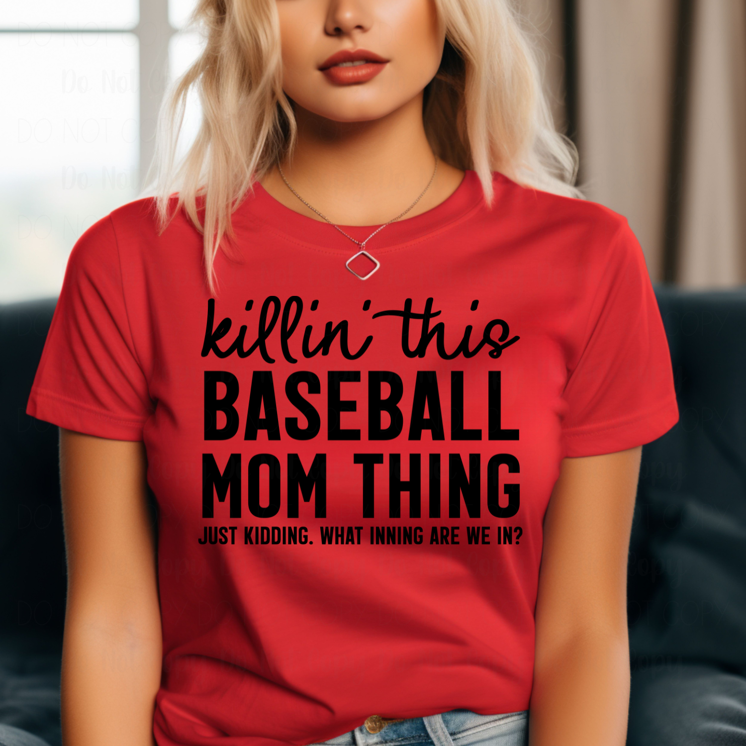 Person wearing a red t-shirt with humorous text design.